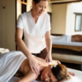 female-message-therapist-giving-a-massage-at-a-spa-W7M4QPC.jpg